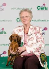 Click to enlarge Ellen with Ch Sonderbar Billie Jean at Stargang winning Best of Breed Crufts 2011 